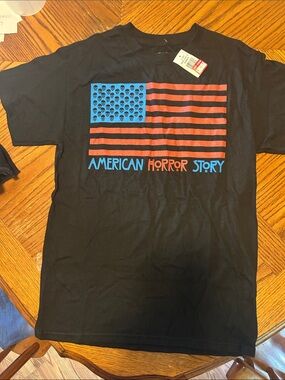 Black Graphic Short-Sleeve Tee with Blue and Red Flag Design